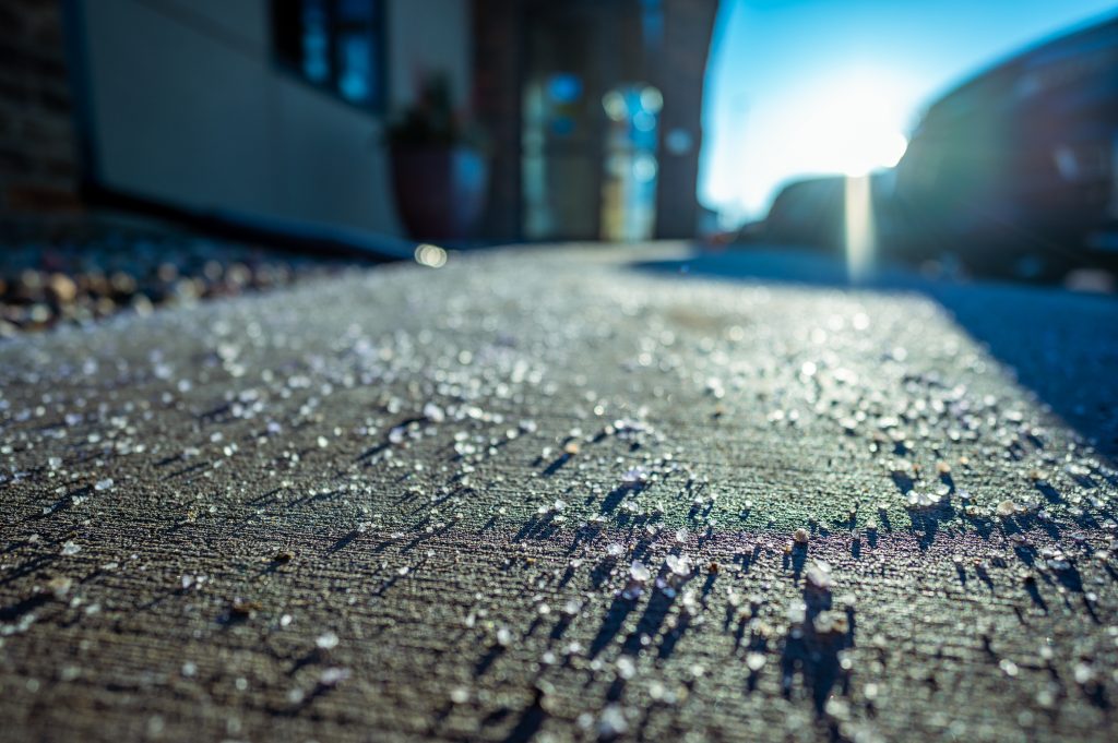 Salt penetrates the pores of concrete steps.